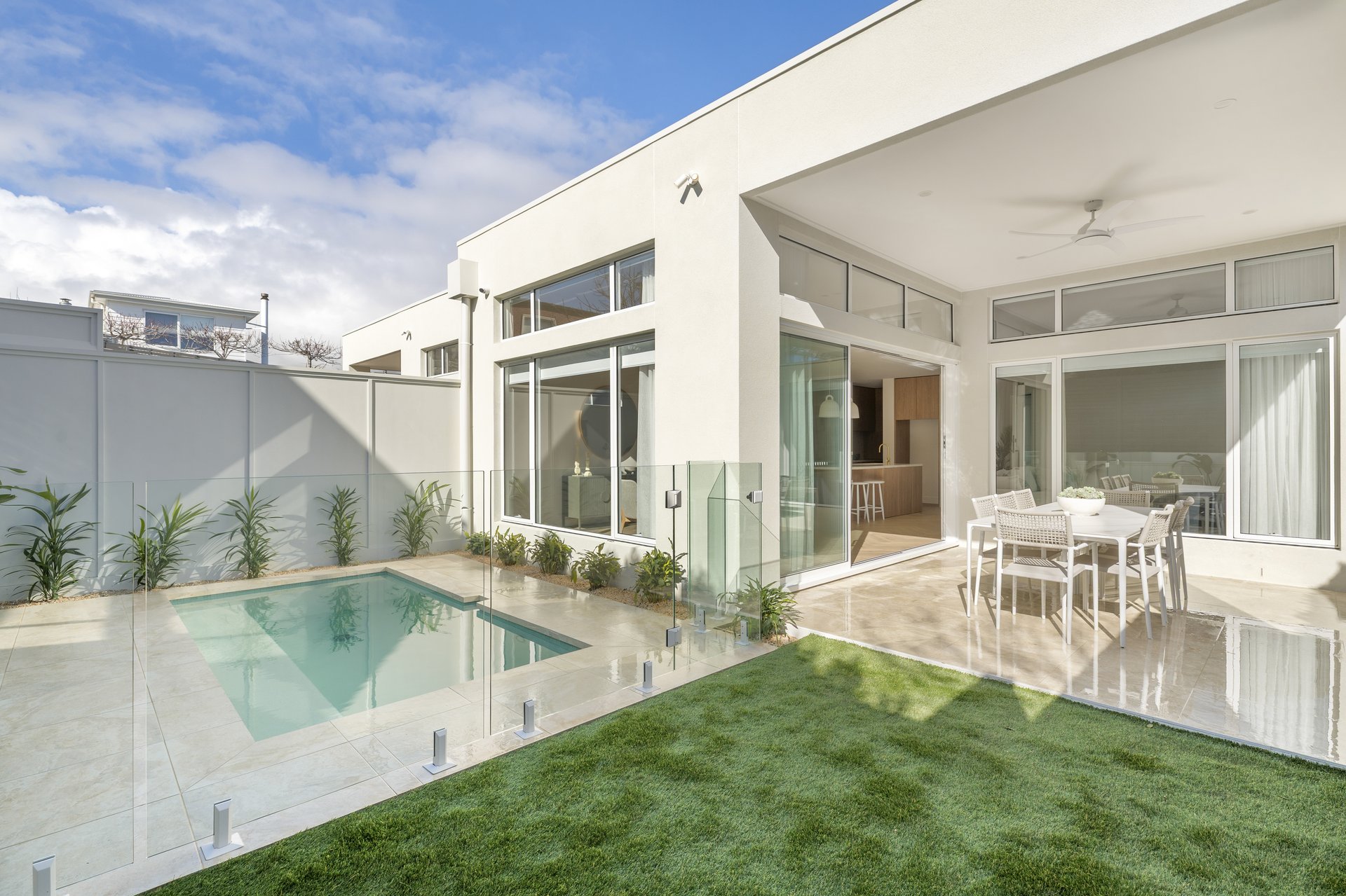 Pool, lawn and covered alfresco dining zone