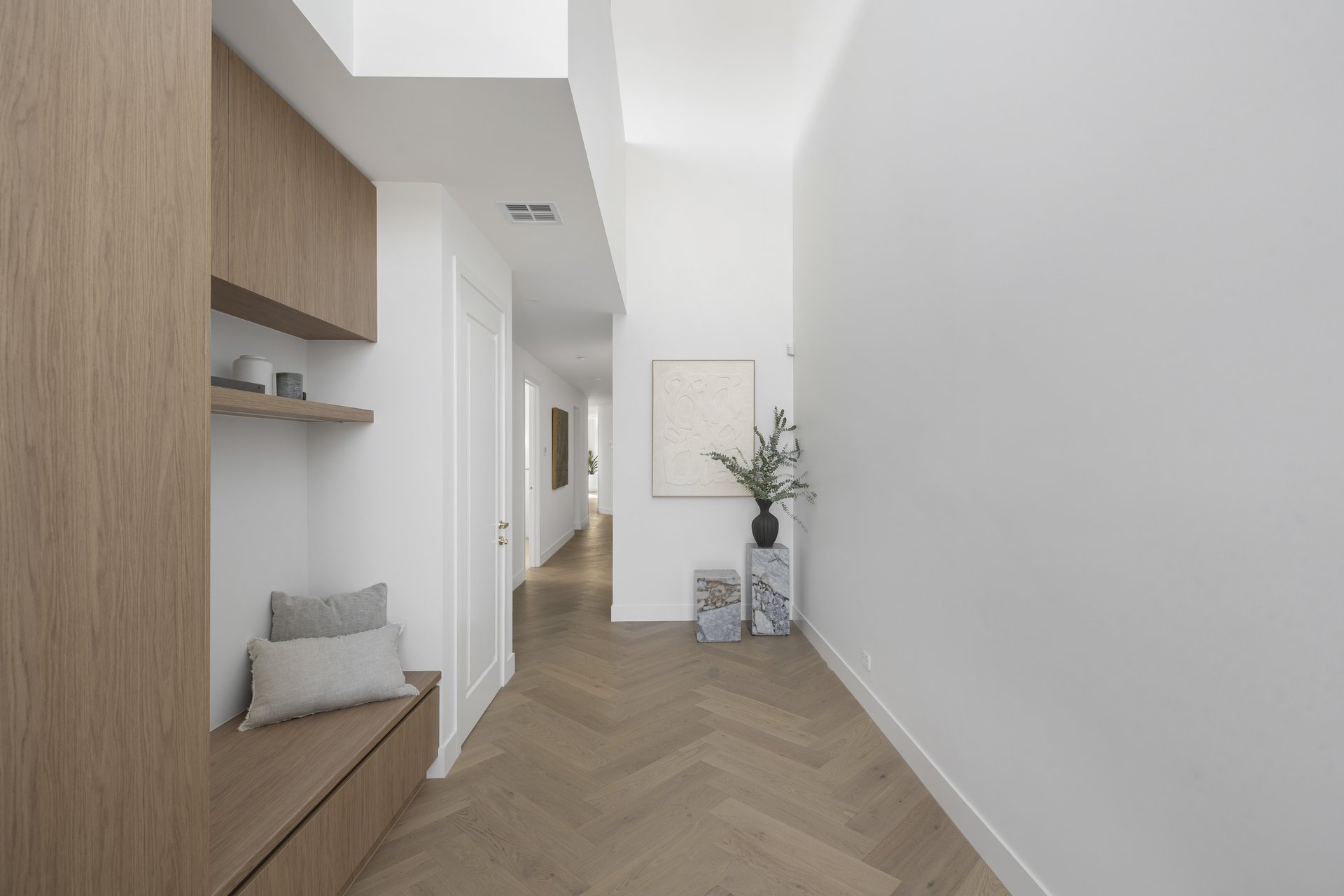 Entry hallway with built-in bench seating