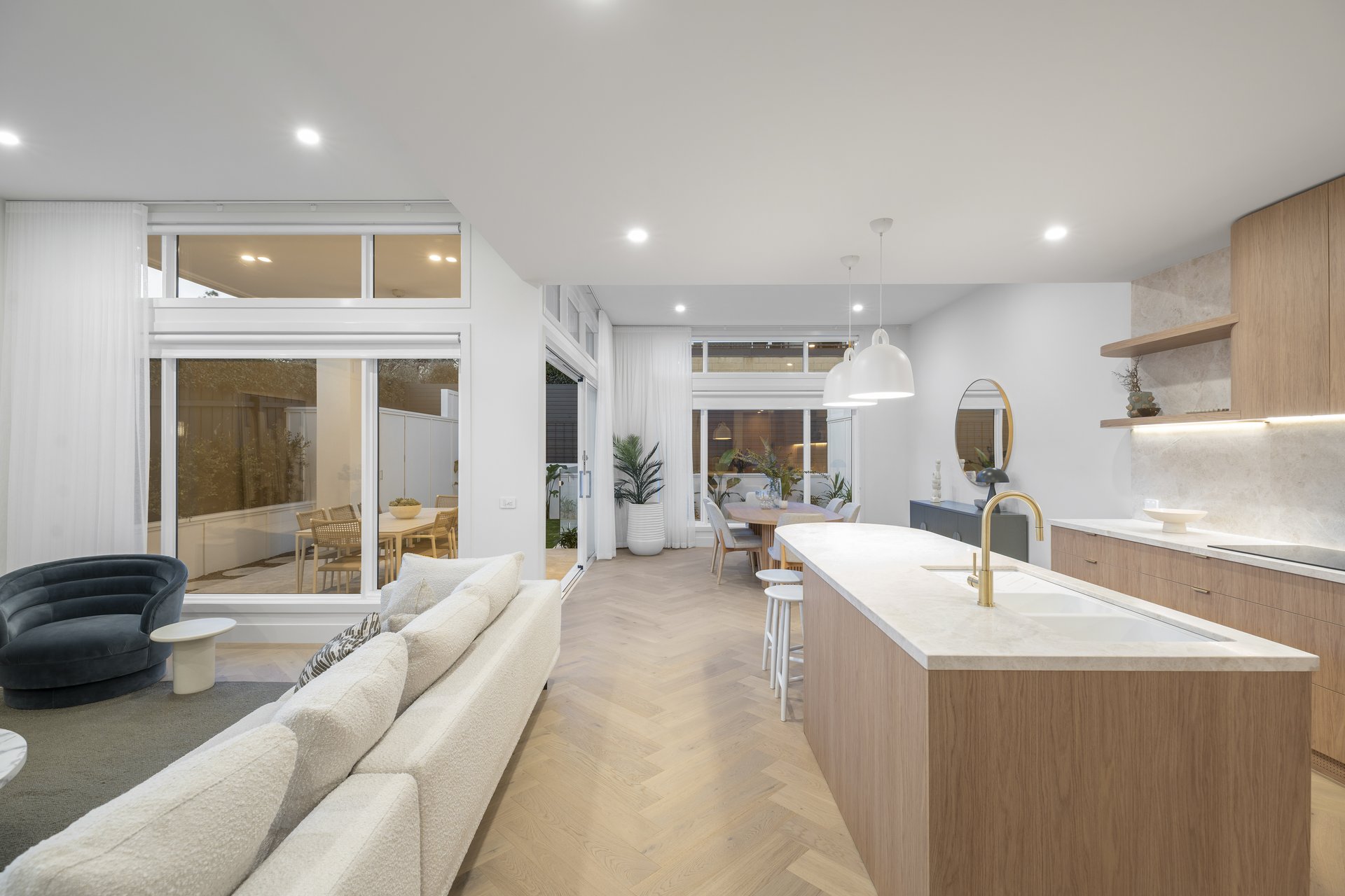 Open-plan living zone looking toward the kitchen
