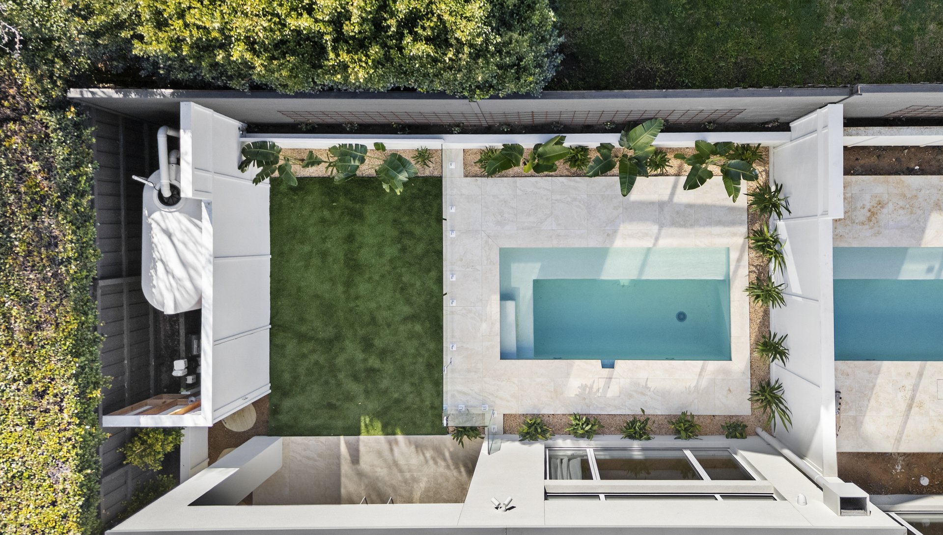 Aerial view of the backyard, pool and lawn